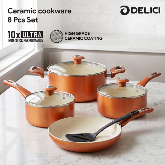 A set of DELICI ceramic cookware on a white marble countertop near a window. The set includes three copper-colored saucepans with glass lids, a matching copper-colored frying pan with a black spatula, and text overlays highlighting '10x ULTRA NON-STICK PERFORMANCE' and 'HIGH GRADE CERAMIC COATING'.